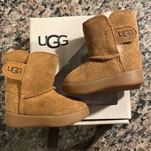 Brand new infant uggs. Size 0/1. Box included. Fits 0-6 months
